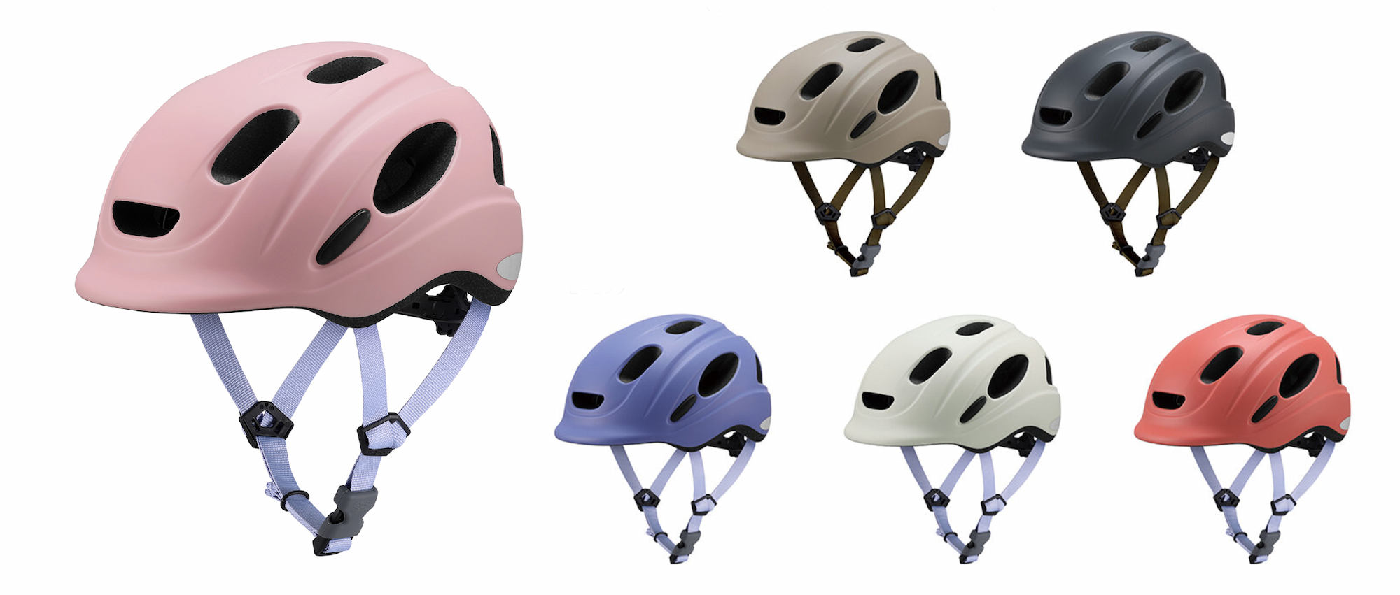 異なる色の子ども用自転車ヘルメットが並んだ製品画像。(カラー展開：左からマットベビーピンク、マットバイオレットブルー、マットベージュ、マットオフホワイト、マットブラック、マットパーシモンレッド)
